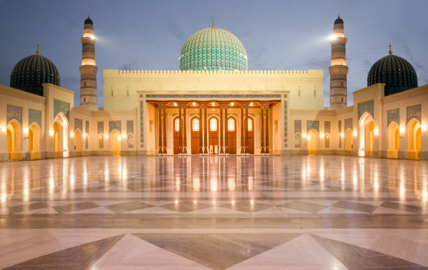 the interior marble floor of the sultan qaboos mosque in sohar after sunset, oman - islam mosque oman greater masqat imagens e fotografias de stock