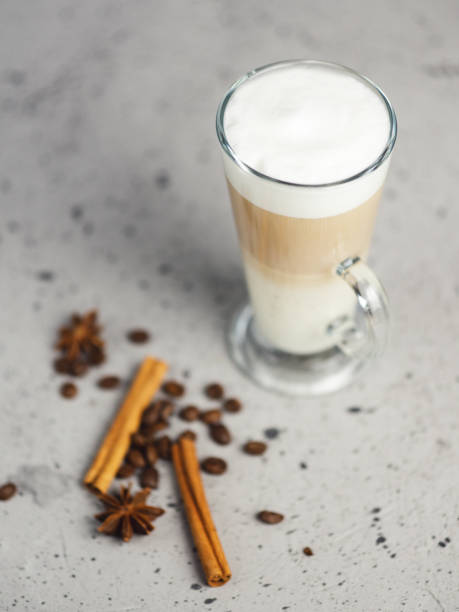 istock Coffee latte in a glass on a concrete table 1165486268