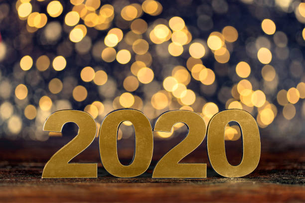 istock Happy New Year 2020. Symbol from number 2020 on abstract background 1165487874