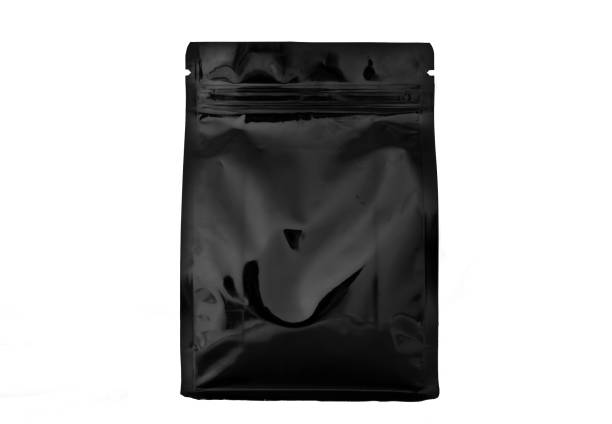 istock matt black plastic and aluminium flat bottom coffee pouch  with zipper  filled with coffee beans on white background fron view 1165489708