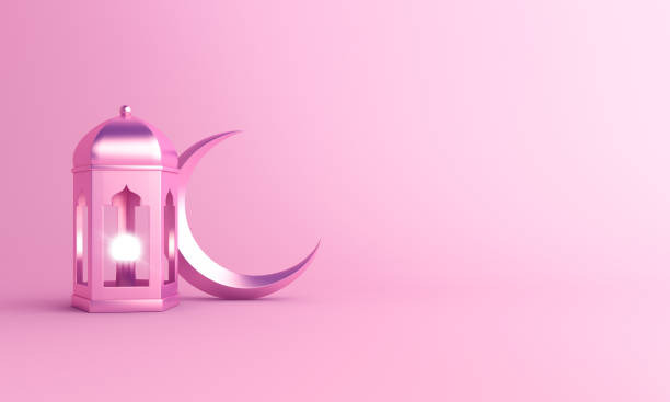 istock Crescent moon and arabic lantern on pink pastel background studio lighting 1165491862