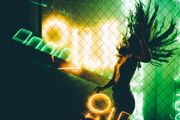 dancing silhouette of girl in a nightclub - bar women silhouette child imagens e fotografias de stock