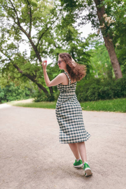 istock Happiness concept - happy woman having fun outdoors during summer 1165500173