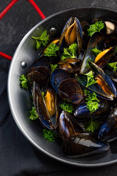 istock Prepared Mussels in Pan with Parsley, Top View 1165503030