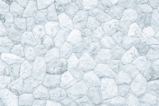 istock Brick stone wall stack of medieval natural stone texture background or rock strata boundary the rock seamless abstract and fragment of a walls from a gray. 1165505726