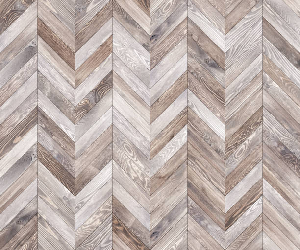 istock Chevron natural parquet seamless floor texture 1165507219