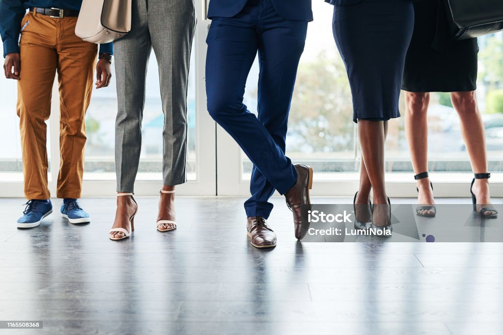 Ready to ace the interview Cropped shot of a diverse group of businesspeople standing before their interviews while in the office during the day Adult Stock Photo