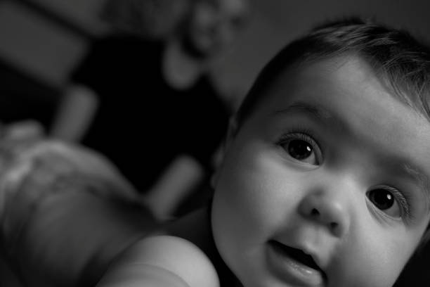 istock Cute little baby with big eyes 1165509929