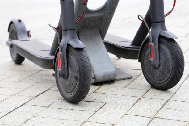 istock Electric scooters parked on a street 1165510222
