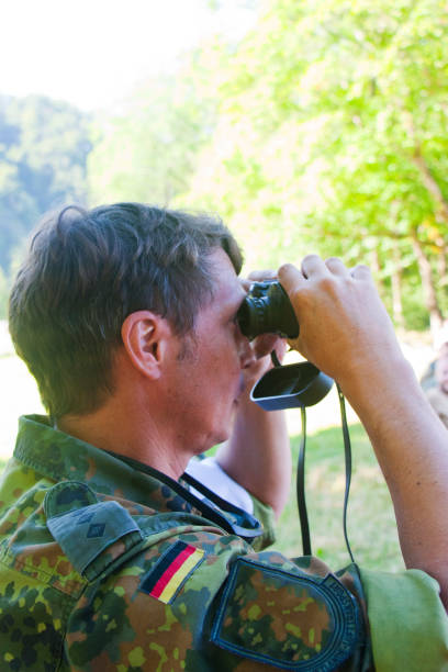 istock Officer of the German Armed Forces with binoculars 1165510815