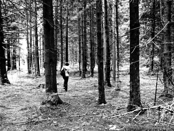 istock A woman in the forest 1165512235