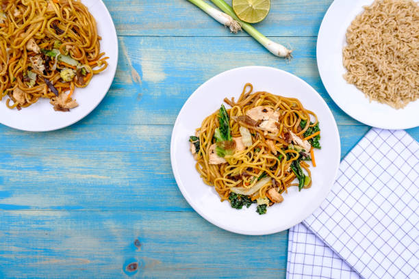 istock Chinese Style Chicken Chow Mein Meal With Egg Noodles 1165513048