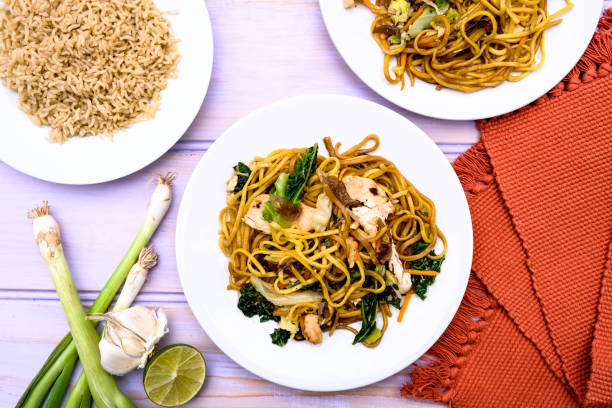 istock Chinese Style Chicken Chow Mein Meal With Egg Noodles 1165513571