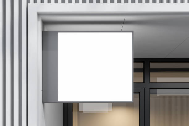 istock Square mock up sign on white building wall 1165514195