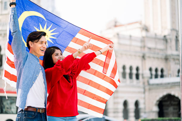 istock Young Adult Celebrating Malaysia Independence Day 1165515535