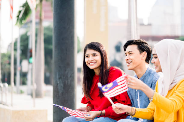 istock Young Adult Celebrating Malaysia Independence Day 1165515566