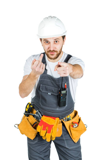 istock A builder or an employee in a protective helmet shows a hand gesture. Isolated over white background. 1165517014