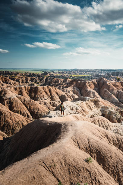 istock hiking at the badlands national park 1165518222