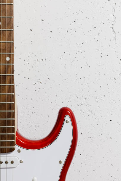 istock Red electric close-up against white raw wall 1165518435