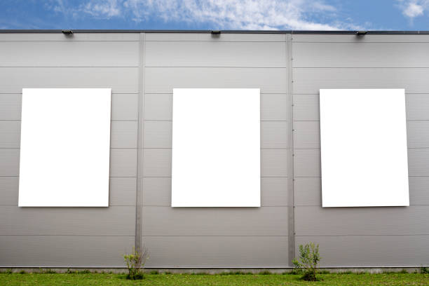 istock Three big vertical poster on the grey building 1165518647
