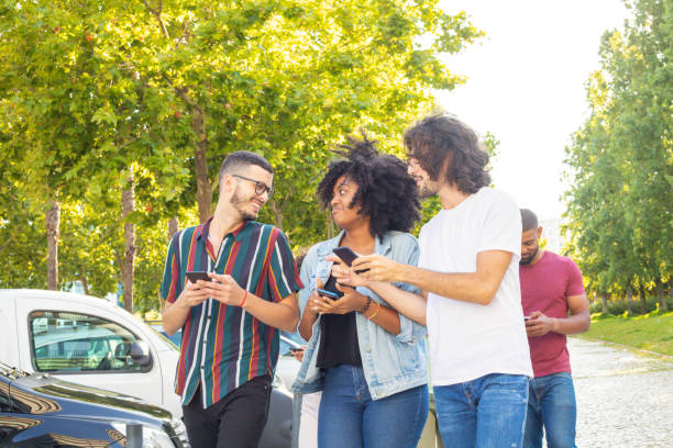 istock Interracial team of three walking outside 1165521603