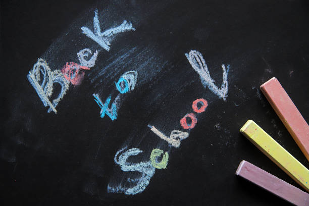 istock Back to school background. Chalk inscription on blackboard 1165521873