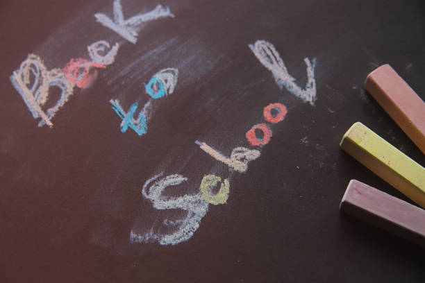 istock Back to school background. Chalk inscription on blackboard 1165521918