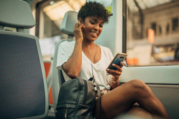 istock Woman riding in train 1165523296