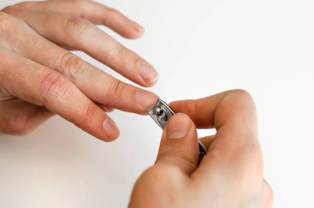 istock A young man does a manicure. Photo. 1165526692