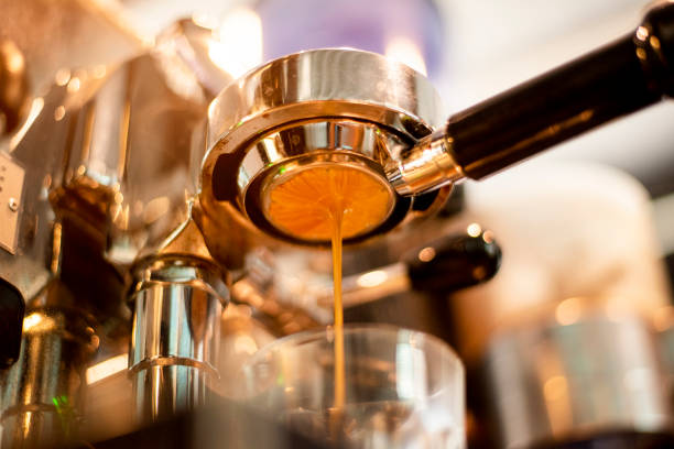 istock Close up of coffee machine is preparing coffee in coffee shop 1165526802
