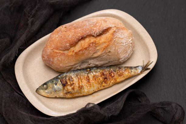 istock grilled sardine with bread on dish 1165536379