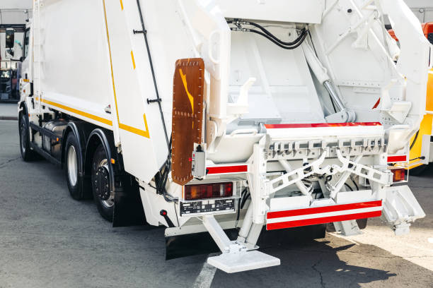 New white modern garbage truck Garbage truck on the street. Municipal and city services. lean future ecology concept utilize stock pictures, royalty-free photos & images