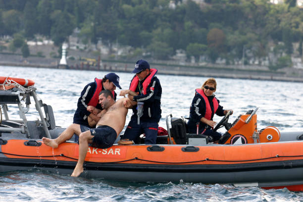Sea Rescue Team saves a man stock photo