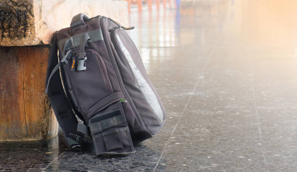 istock Black  bag beside the chair and copy space 1165550807