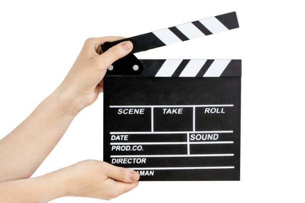 istock Hands holding clapper board  isolated on white with clipping path 1165551089