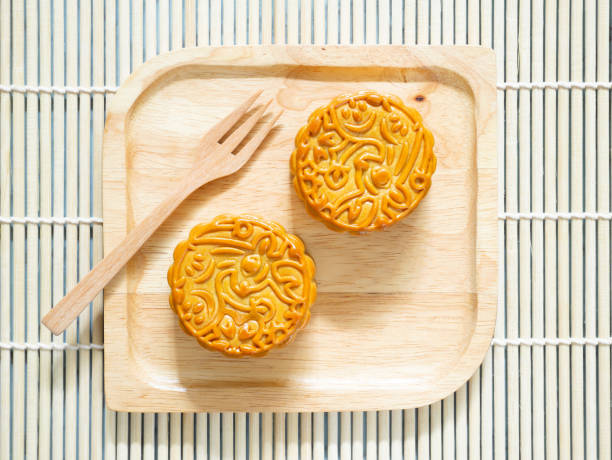 istock Mooncakes on a wooden plate 1165552449
