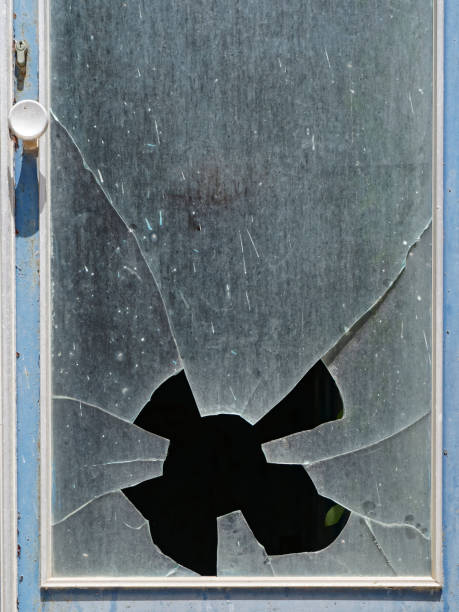 istock Shattered window in door 1165556942