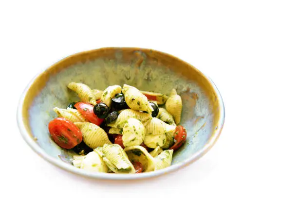 Fresh pasta salad with olives, cherry tomato