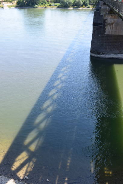 istock shadows of a bridge 1165558275