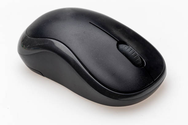 istock wireless mouse and USB dongle isolated on white background. 1165561407