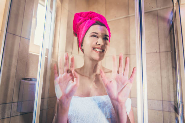istock Woman leaning on the shower screen 1165561458