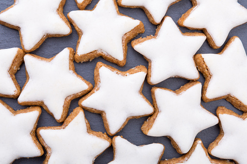 cinnamon christmas biscuits on black background