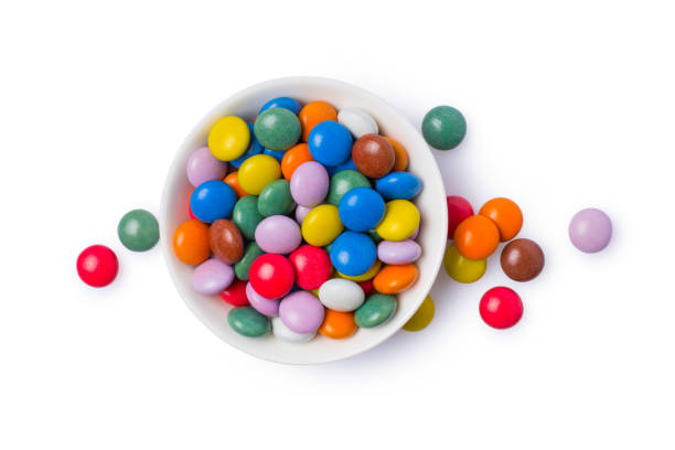 Chocolate multicolored glaze dragee or candies in bowl