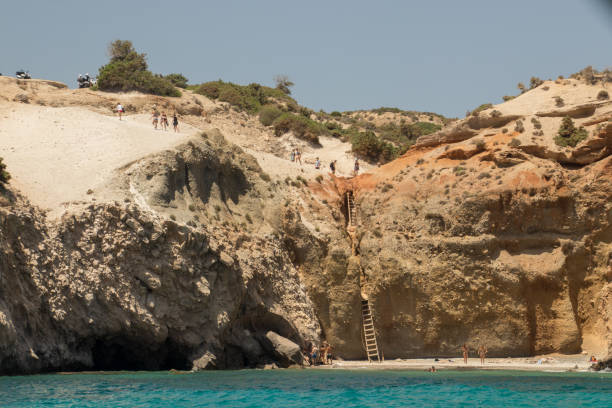 istock Tsigrado beach with people, Milos island 1165566619