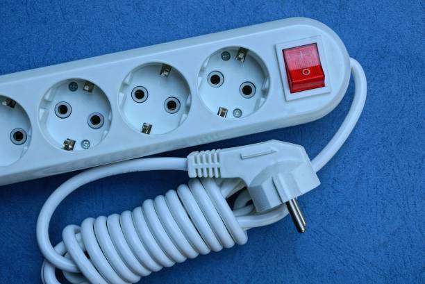 istock part of a gray extension cord with sockets and cable 1165570865