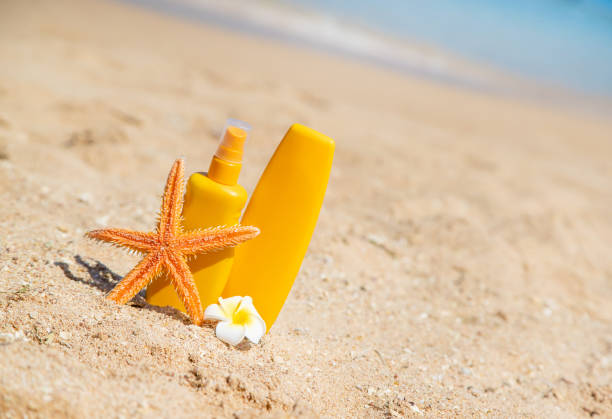 istock sunblock on the beach. Sun protection. Selective focus. 1165571427