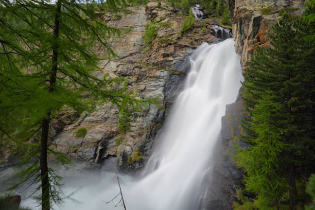 istock Lillaz waterfall among rocks, Aosta Valley, Italy 1165573391
