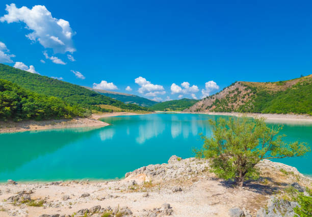 Fiastra lake and Lame Rosse canyon (Marche, Italy) Naturalistic wild attraction in the Monti Sibillini National Park, province of Macerata, Marche region, central Italy macerata italy stock pictures, royalty-free photos & images