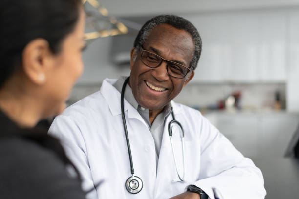istock Kind physician consults patient 1165576075