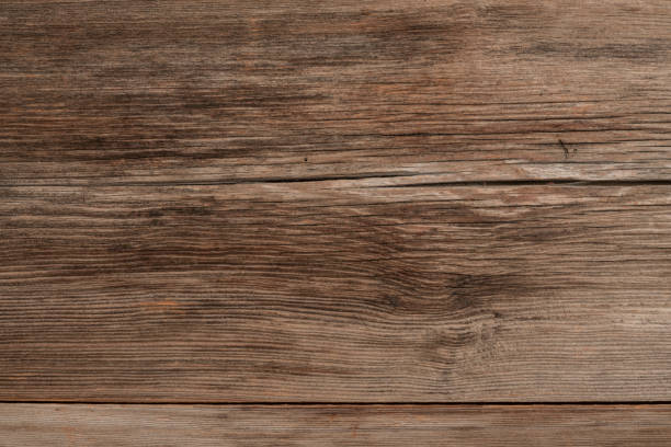 istock rough and natural wooden background 1165578678
